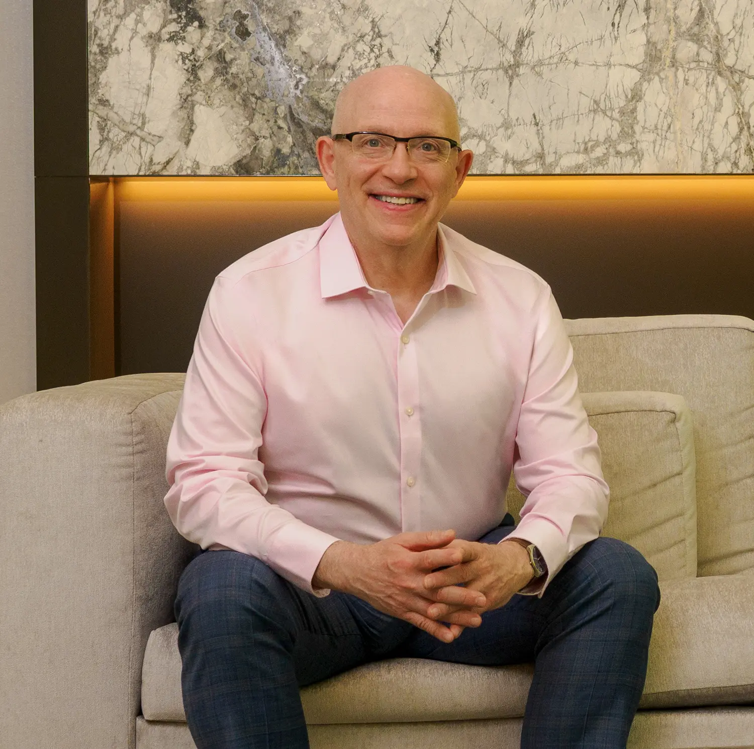Dr. Jeremy Peyser seated in the Peyser Dental waiting room